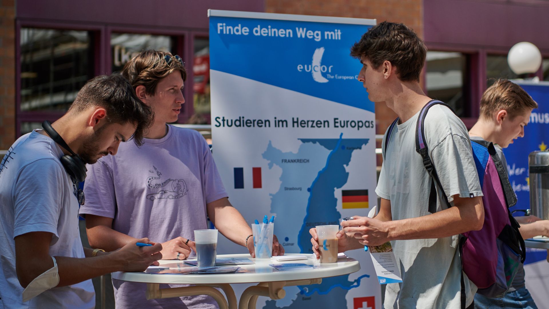 Students discuss studying abroad opportunities at a Europass event.