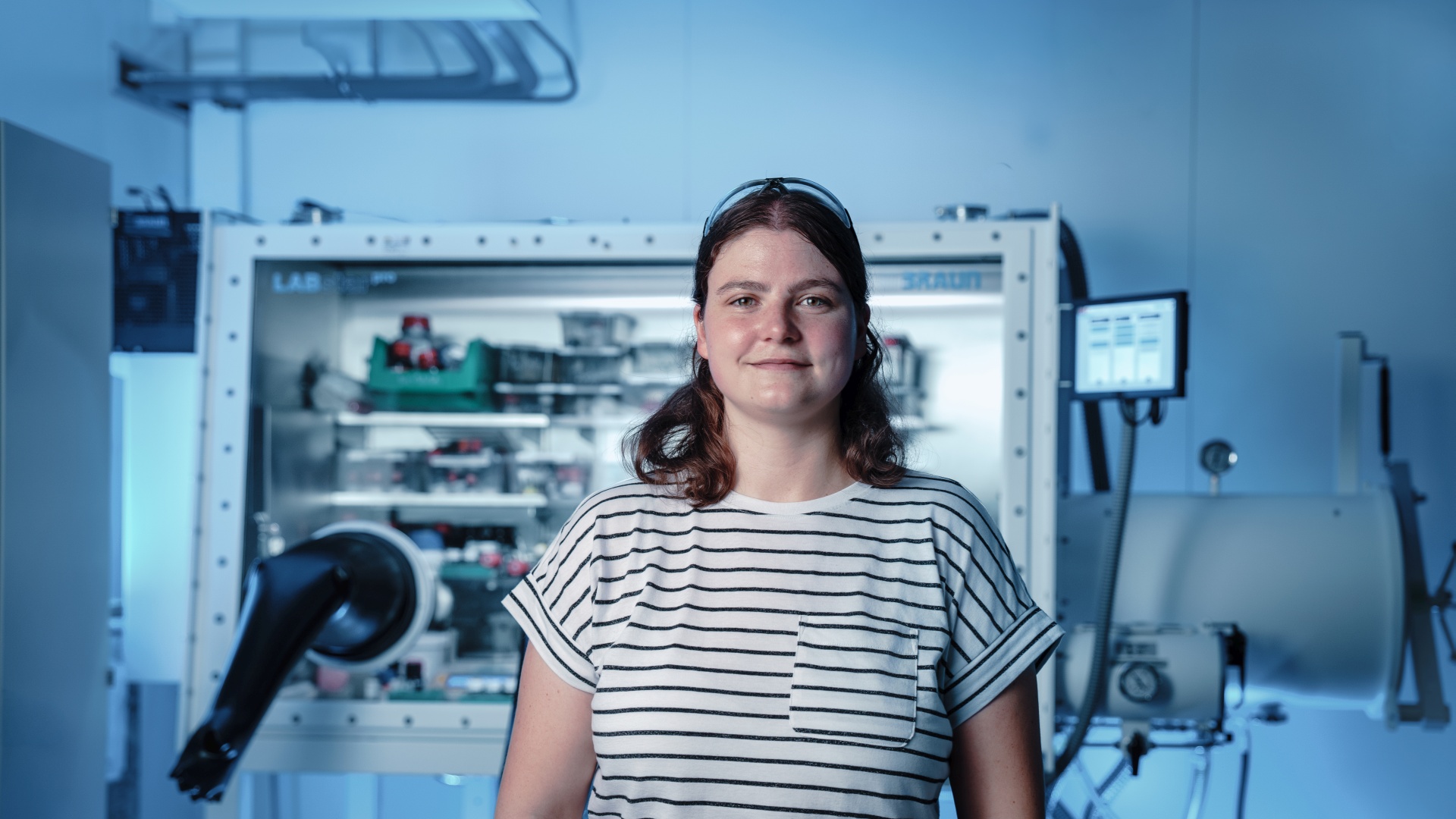Luise Klink poses inside a chemistry lab for a photo.